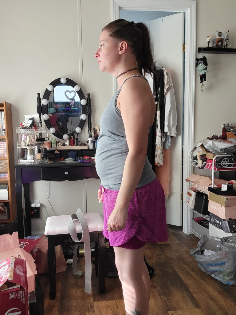 Side view of Niki in exercise gear